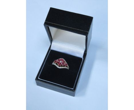 9ct GOLD DRESS RING SET WITH RUBY COLOURED STONE AND CLEAR STONES