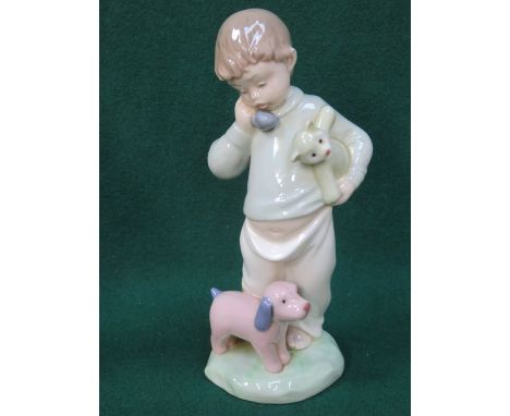 NAO GLAZED CERAMIC FIGURE OF A BOY, APPROXIMATELY 20cm HIGH