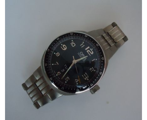 Oris TT3 Titanium automatic watch. 
This is a Pre-owned but excellent condtion Oris TT3. 
The TT3 has a 43.5mm (48mm includin