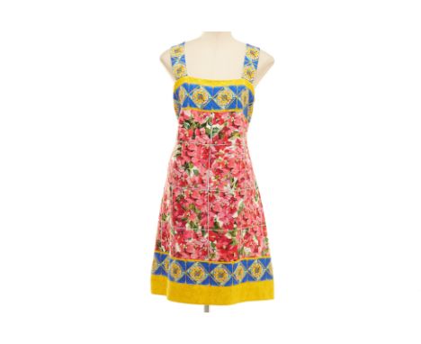 A DOLCE &amp; GABBANA FLORAL TILE PRINT DRESS
Multicoloured floral tiled printed sleeveless dress with zip closure to the bac