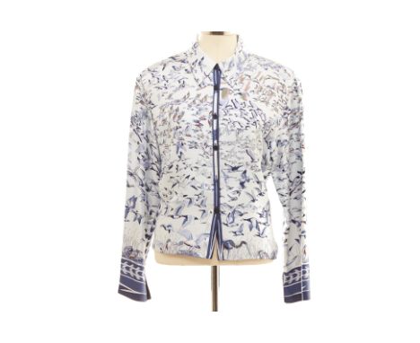 AN HERMÈS 'LIBRE COMME L'AIRE' GEESE PRINT SILK SHIRT
Printed silk buttoned shirt
Hermes
Size IT 40
Condition: Minor signs of