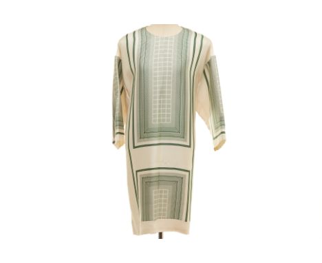 A CELINE WHITE &amp; GREEN SILK TUNIC DRESS
Two- tone light champagne white and forest green satin three-quarter sleeve dress