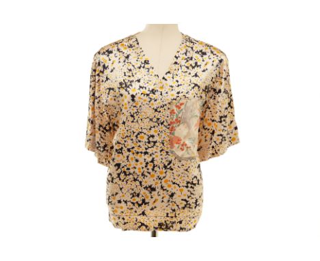 A CELINE DAISY PRINTED SILK BLOUSE
Multicoloured floral V neck silk blouse with contrasting floral print to the front pocket
