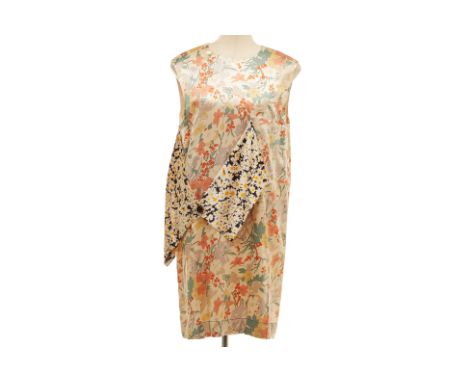 A CELINE 'MULBERRY' FLORAL SILK DRESS
Multicoloured floral silk shift dress with decorative contrasting flap detail to the ri