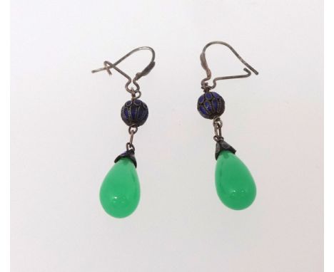 A pair of jade drop earrings with enamelled ball decoration.