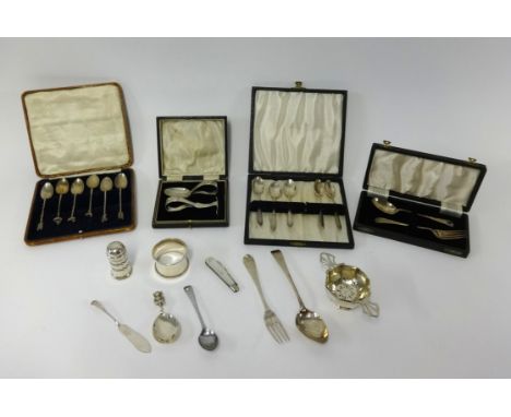 A mix of various silverwares including silver teaspoons, baby spoon and feeder, napkin ring, small dishes, novelty devil cadd