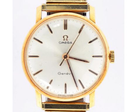 AN OMEGA 18CT GOLD GENTLEMAN'S WRISTWATCH, ON A PLATED BRACELET, WITH PAPERS