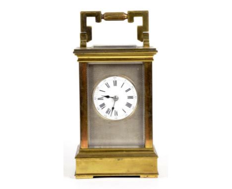 A FRENCH BRASS CARRIAGE CLOCK, THE ENAMEL DIAL WITH SILVERED, ENGINE TURNED MASK IN ANGLAISE CASE, THE MOVEMENT STRIKING ON A