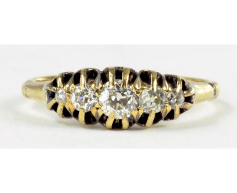 A DIAMOND FIVE STONE RING IN GOLD, MARKED 18CT PLAT, 2.9G GROSS