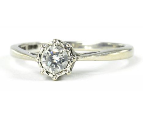 A DIAMOND SOLITAIRE RING, ILLUSION SET IN 18CT WHITE GOLD, 3.1G GROSS