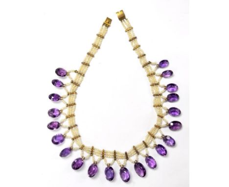 A BELLE EPOQUE AMETHYST, SEED PEARL AND GOLD FRINGE NECKLACE, WITH GOLD CLASP, CIRCA 1910