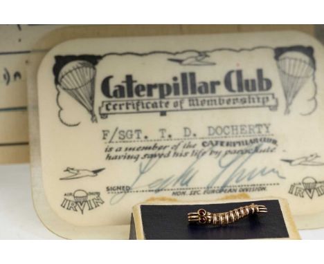 CATERPILLAR CLUB BROOCH AWARDED TO F/SGT. THOMAS DOCHERTY WWII-PERIOD with red cabouchon set eyes, inscribed F.SGT. T.DOCHERT