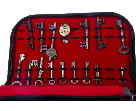 INTERESTING AND VARIED COLLECTION OF ANTIQUE KEYS comprising thirty-five keys including military, police, double bit, a Berli