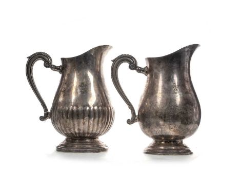 SADDAM HUSSEIN INTEREST (IRAQI, 1937–2006), TWO SILVER PLATED WATER JUGS CIRCA 1990-2004 the baluster jugs by Christophle of 
