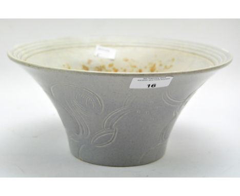 A Susie Cooper ceramic studio bowl, of flared form, the exterior incised with squirrels, signed and dated '1932' to the base,