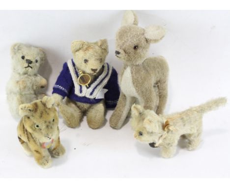 A selection of vintage soft toys, to include a Steiff Tiger and various Teddy Bears