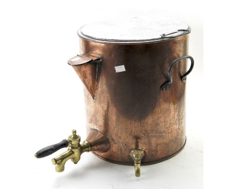 A large copper drink dispenser, of circular form with a ceramic interior and brass handles and taps, height 37.5cm