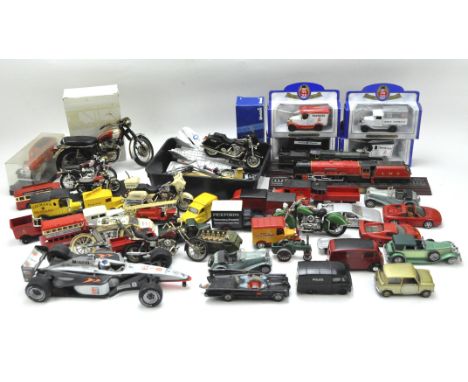 A collection of diecast model vehicles, the motorcycles, cars, trains and other vehicles by an assortment of makers including