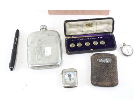 An assortment of collectables, including a set of five military buttons from the Manchester regiment in a fitted box, a match