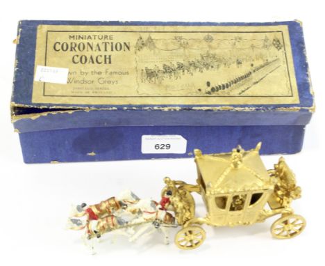 A Johillco Series Miniature Coronation Coach, 'drawn by the Famous Windsor Greys', with King and Queen figures present, in th
