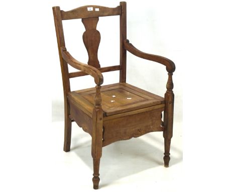 A 19th century mahogany commode chair, on turned supports, height 98cm