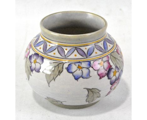 A 20th century hand painted vase by Charlotte Rhead, of squat form, decorated with blue and red foliate motifs, marked to bas