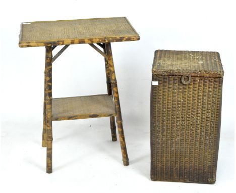 A 20th century bamboo two tier occasional table and a Lloyd Loom linen basket, the table measuring 67cm x 54cm x 37cm, the li