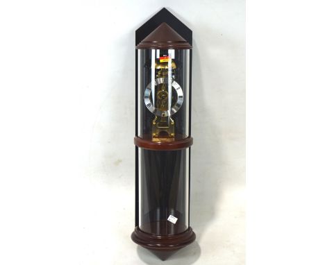 A contemporary German Hermle skeleton clock, model 70550, the clock face with a silver dial with Roman numerals, contained wi