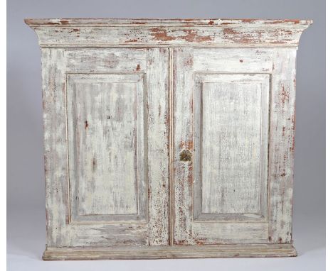 19th Century Swedish dry scraped hanging wall cupboard, the pair of panel doors enclosing two shelves, 106cm wide, 92cm tall,