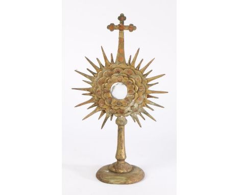 19th Century French reliquary frame, in gilt with a central glazed panel and starburst surround, 43cm high
