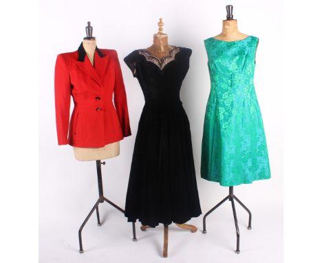 A 1940s Glenbuie red wool jacket; with a 1950s Susan Small party frock, a black velvet evening jacket, a 1960s emerald green 