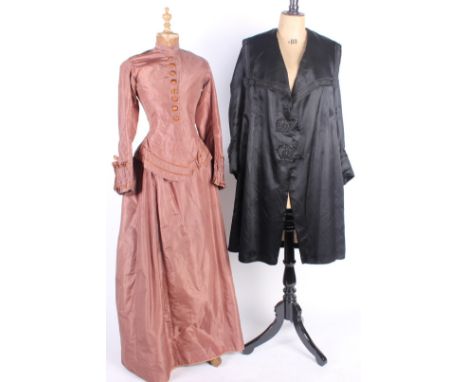 A 19th century pale brown silk two-piece costume; together with a pink silk bodice, midnight blue velvet jacket, a pale fawn 