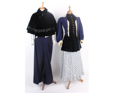 A 19th century midnight blue velvet cape; with a blue and white checked cotton skirt, a dark blue velvet waistcoat with metal