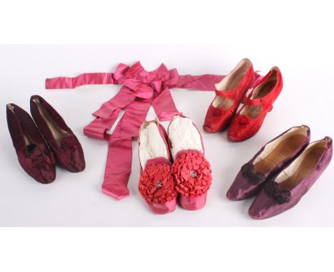 A pair of 19th century dark maroon silk shoes with white kid leather lining; a pair of burgundy silk pumps by Peter Yapp of S