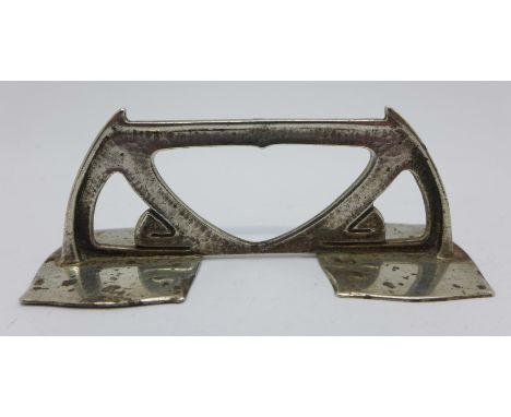 A William Hair Haseler silver knife rest, Liberty style, Birmingham 1904 