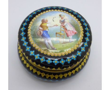 A French gilt metal and enamel box, late 19th Century, a/f, diameter 72mm 