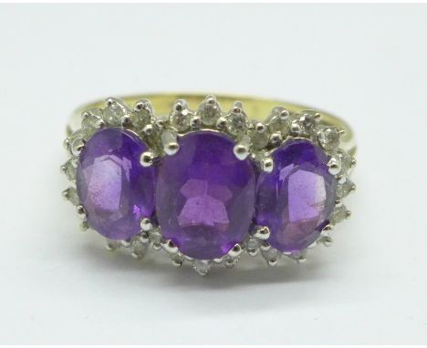 A 9ct gold, amethyst and diamond ring, 3.2g, R 