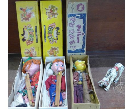 Three Pelham puppets, Mr Turnip, Torchy and Twizzle, boxed and a metal Muffin the Mule puppet 