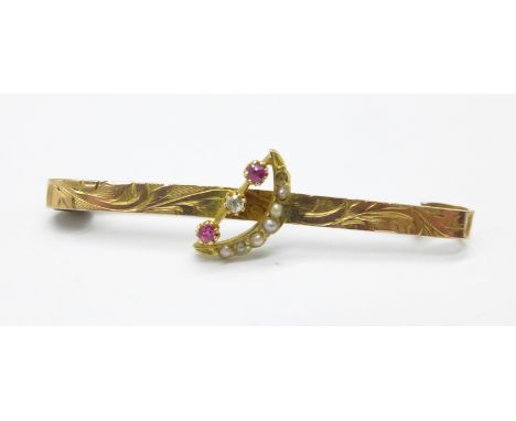 A 9ct gold, ruby and diamond crescent brooch, one small pearl missing, 2g 