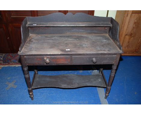 A pine wash stand with two drawers and under shelf, 42" long x 40" high x 18" deep.