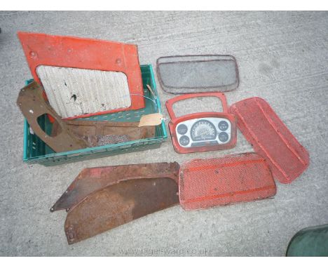 A quantity of Nuffield spares including 4 mesh grill panels, a 4/65 side panel, an engine valve-chest plate, sheet steel pane