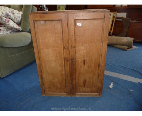 A pine three shelf kitchen cupboard with key, 37" high x 28" wide x 10 1/2" deep.