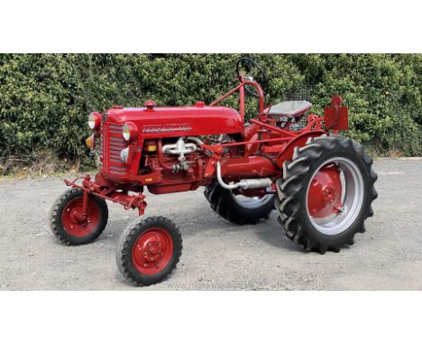 A nicely presented International McCormick Farmall F.F. Cub 1,000 cc. petrol-engined farm tractor Registration No: 594 YUE (N