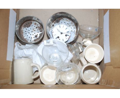 Box of china, sundae dishes and an enamel faced clock movement.