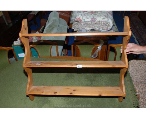 A three shelf pine display stand, 33 1/2" wide x 30" high x 6" deep.