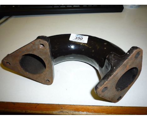 A black enamelled finish exhaust elbow apparently for a Zetor tractor, believed suitable for models 5211, 5245, 6211, 6245, 7