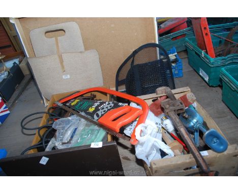 Box of various saws, spanners, hand tools, Stilsons etc.