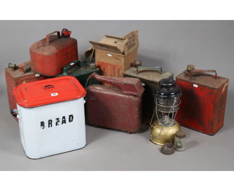 Six vintage petrol cans; a Tilley lamp, boxed; &amp; a white &amp; red enamelled bread bin.