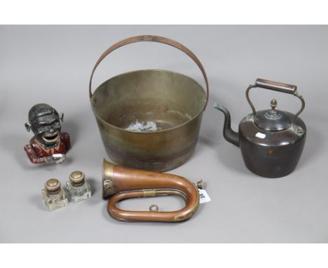 An early 20th century French copper &amp; brass bugle; together with a brass preserve pan with an iron overhang handle; a cop