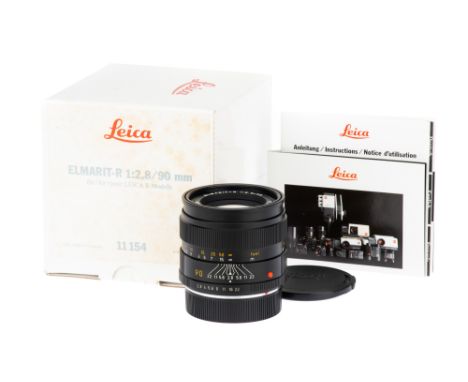 A Leitz Elmarit-R f/2.8 90mm Lens, 1991, black, serial no. 3551484, body, E, elements, E, complete with caps and maker's orig